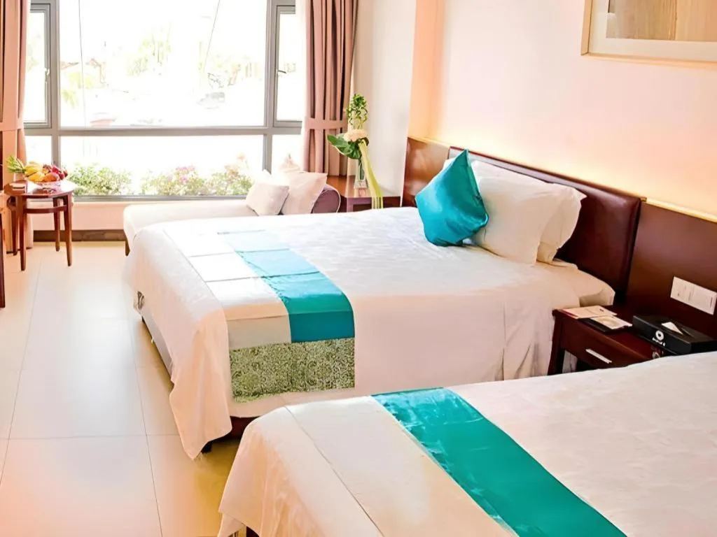Bed in Sanya Luyi Sea View Hotel