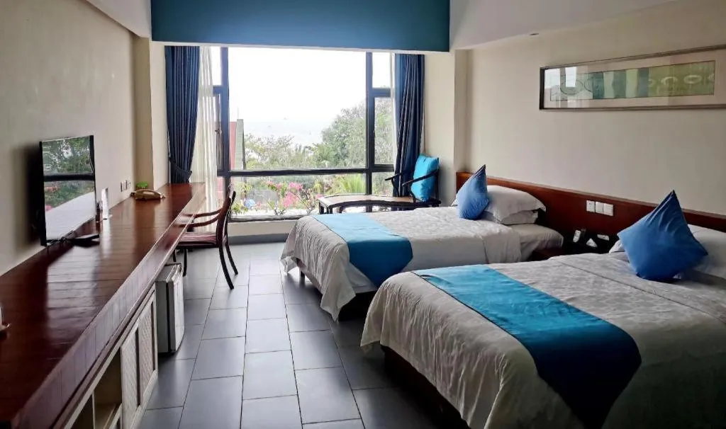 Bed in Sanya Luyi Sea View Hotel