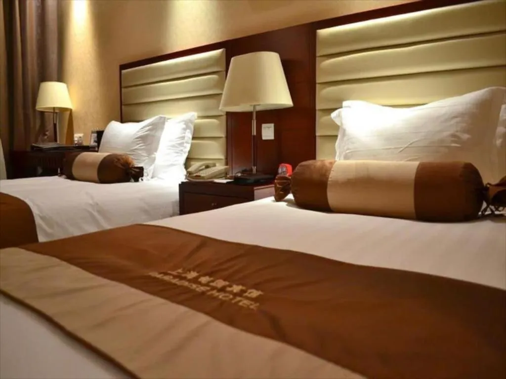 Bed in Paradise Jinjiang Hotel