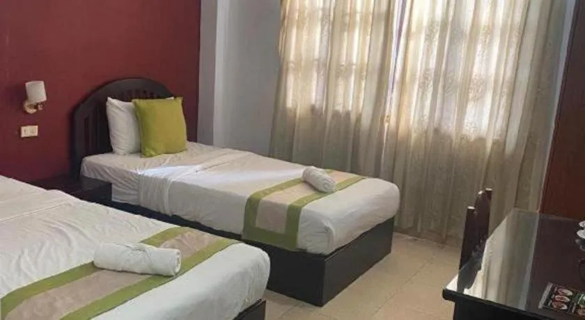 Bed in Saysamphanh Hotel