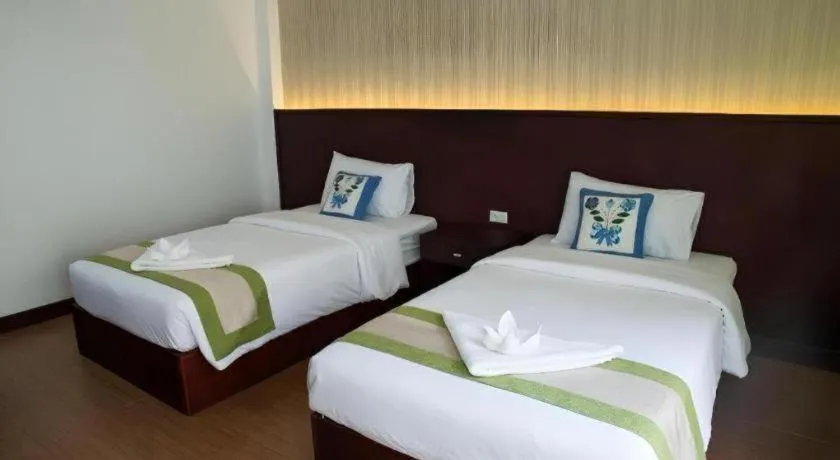 Bed in Saysamphanh Hotel