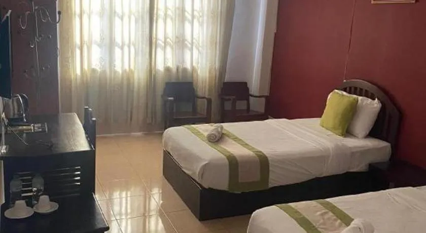 Bed in Saysamphanh Hotel