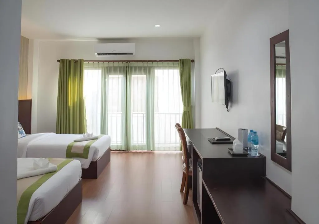 Bed in Saysamphanh Hotel