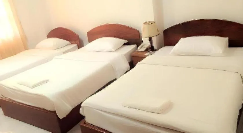 Bed in Saysamphanh Hotel