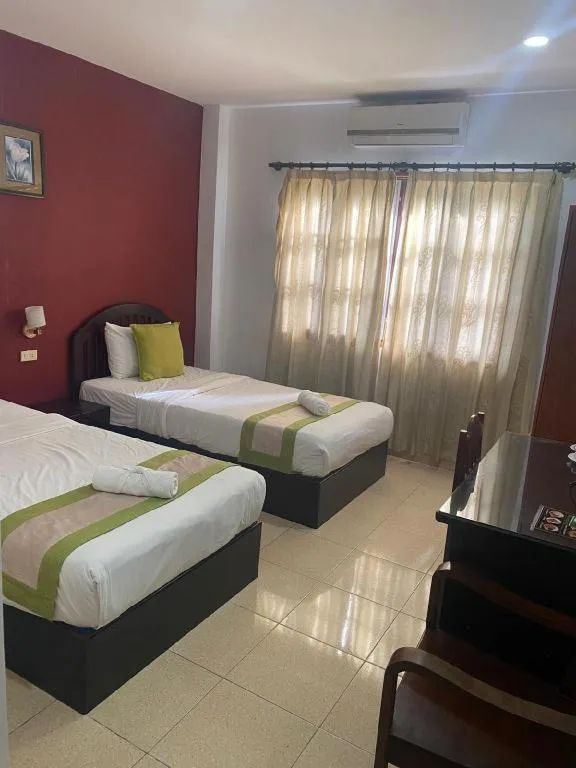 Bed in Saysamphanh Hotel