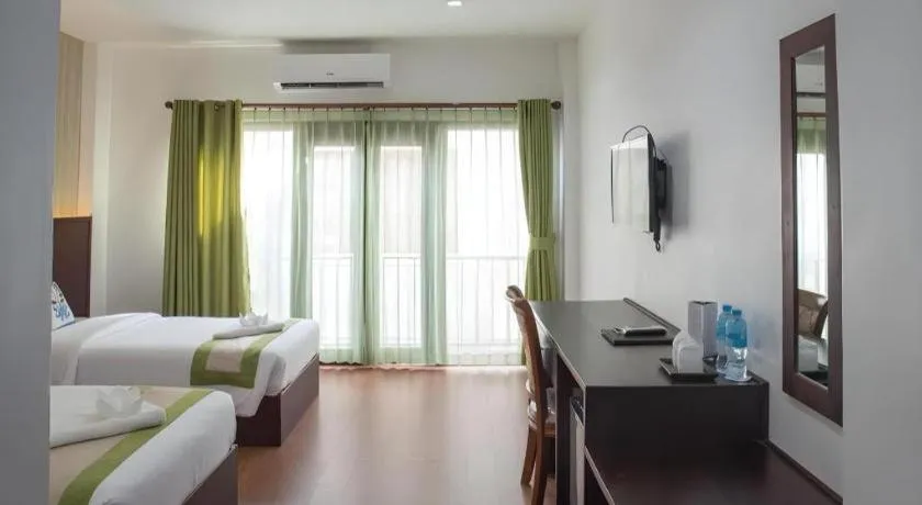 Bed in Saysamphanh Hotel