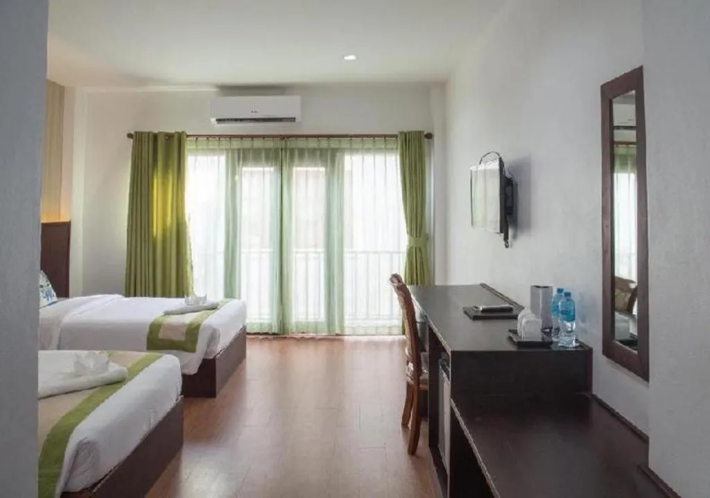 Bed in Saysamphanh Hotel