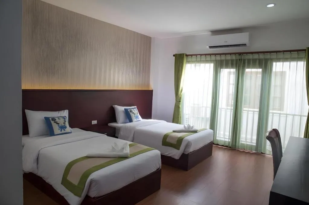 Bed in Saysamphanh Hotel