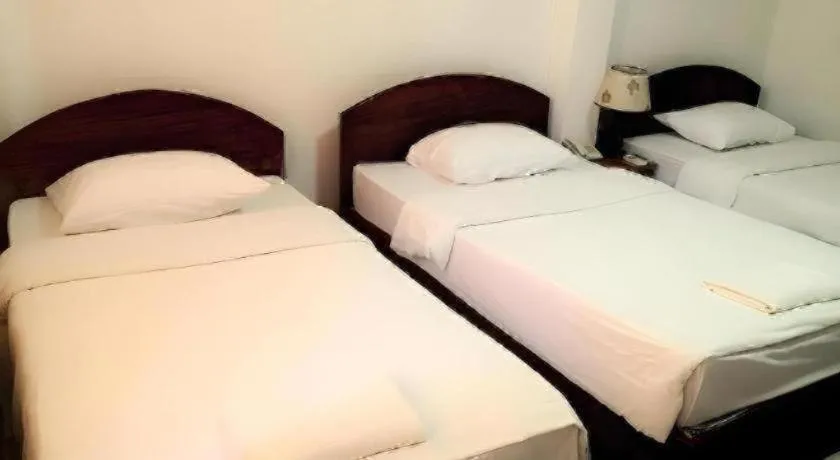Bed in Saysamphanh Hotel
