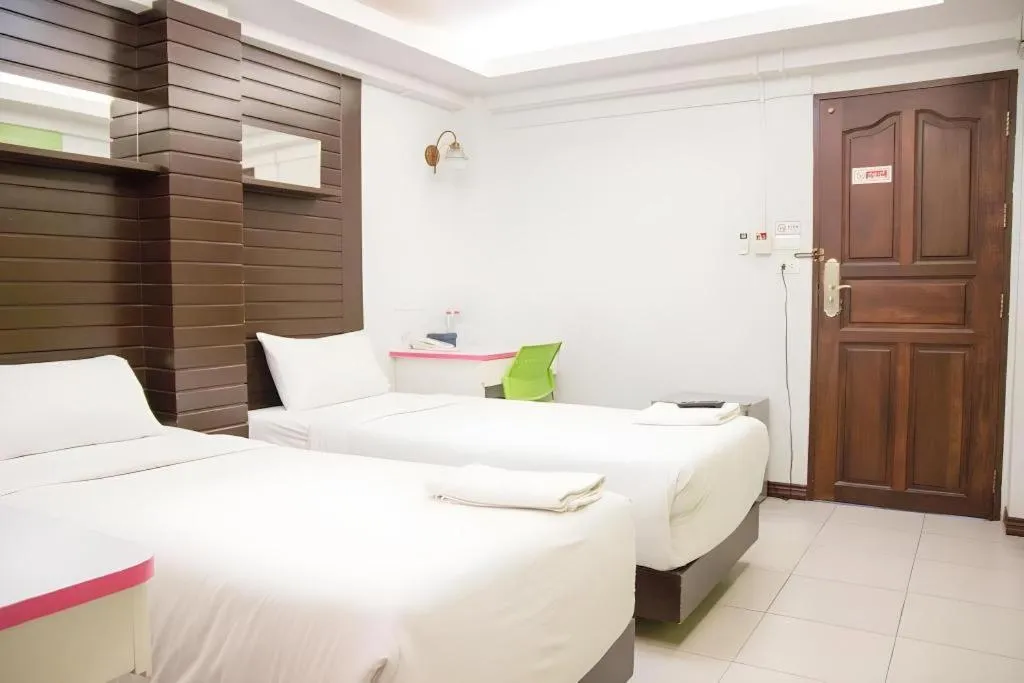 Bed in Huay Kaew Palace 1 Hotel