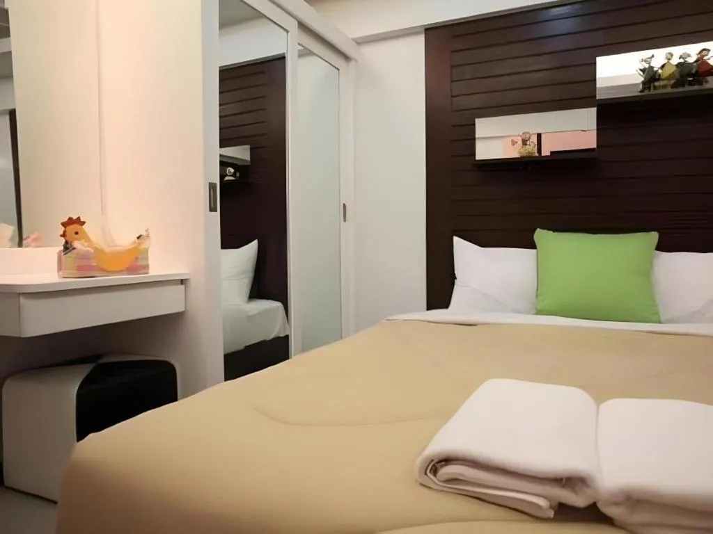 Bed in Huay Kaew Palace 1 Hotel