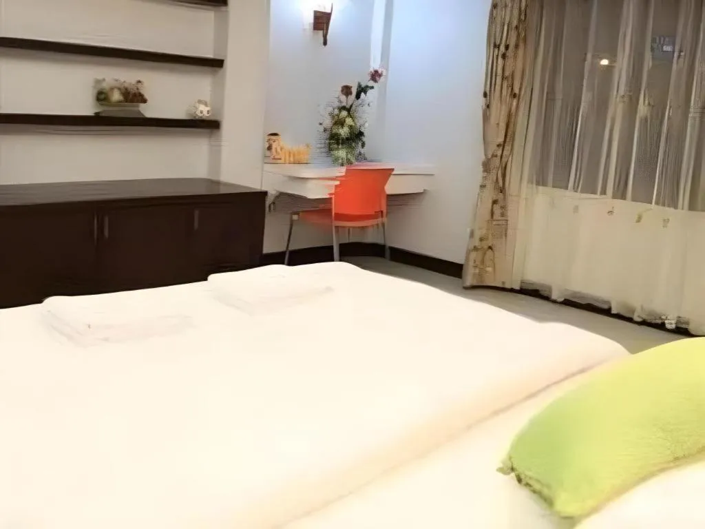 Bed in Huay Kaew Palace 1 Hotel