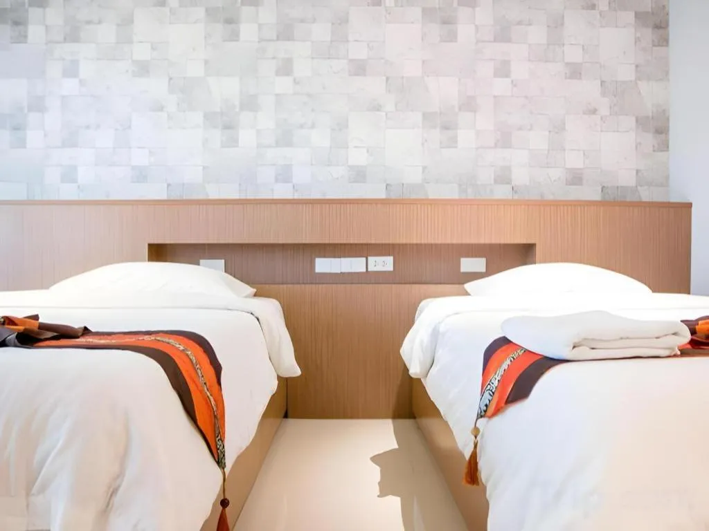 Bed in Huay Kaew Palace 1 Hotel