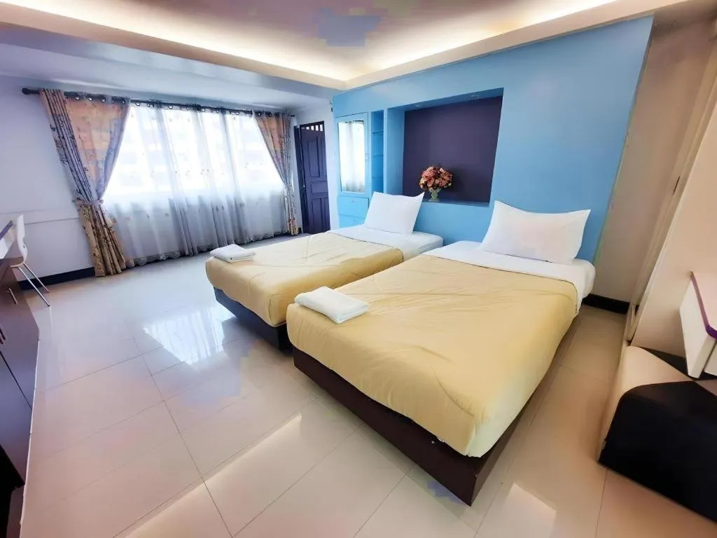 Bed in Huay Kaew Palace 1 Hotel