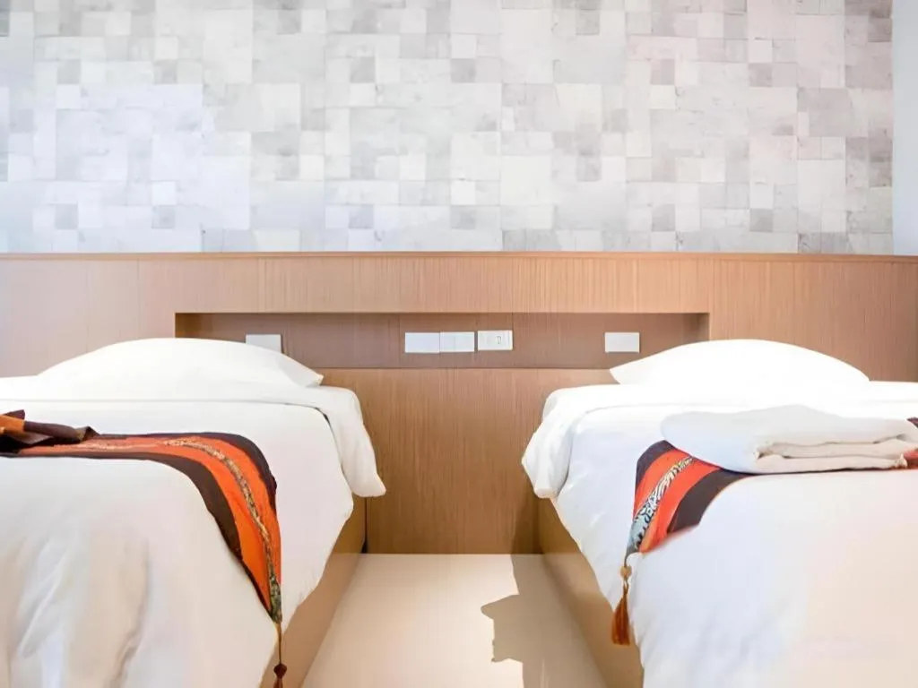 Bed in Huay Kaew Palace 1 Hotel