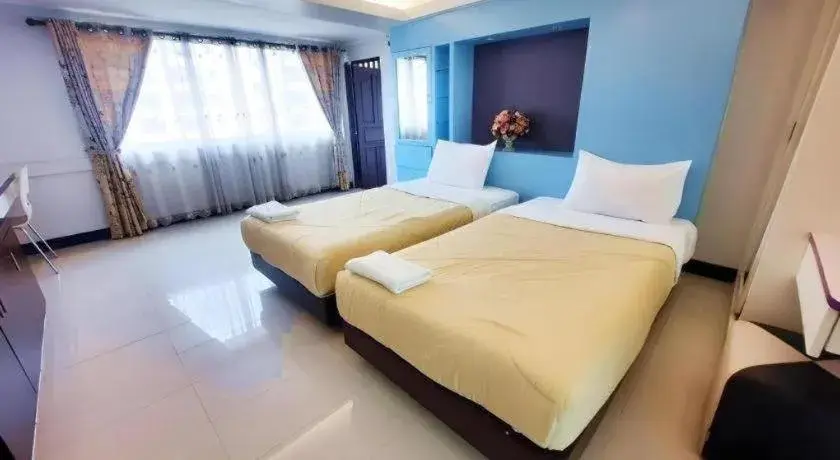 Bed in Huay Kaew Palace 1 Hotel Bed in Huay Kaew Palace 1 Hotel