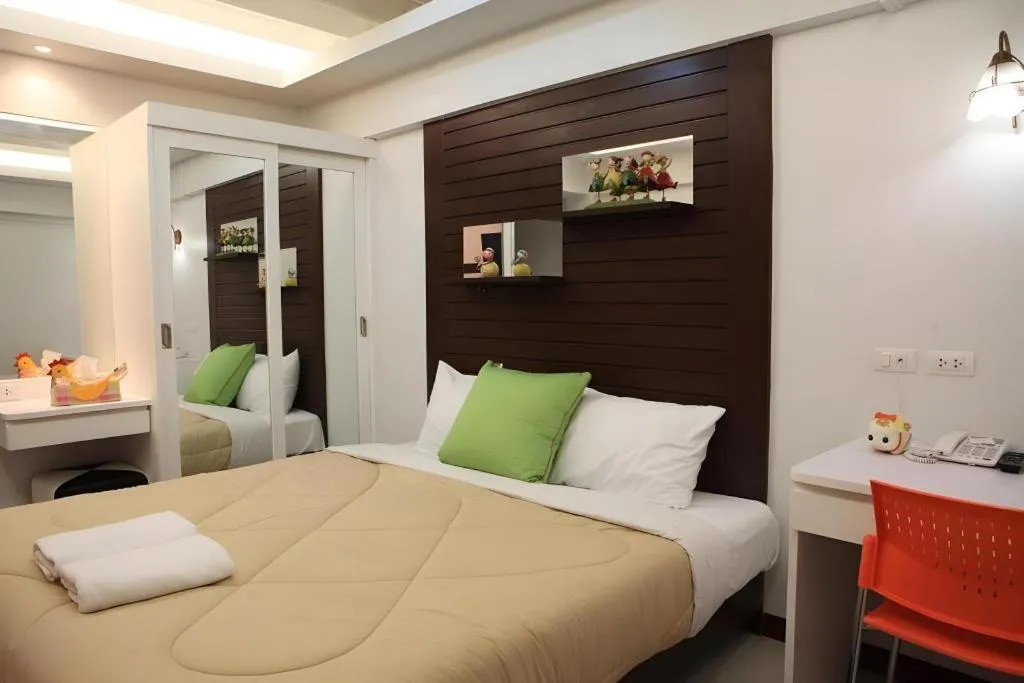 Bed in Huay Kaew Palace 1 Hotel