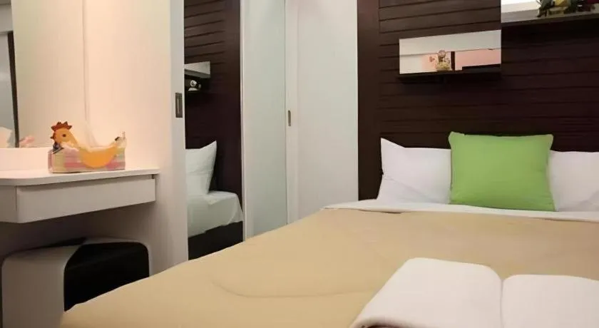 Bed in Huay Kaew Palace 1 Hotel