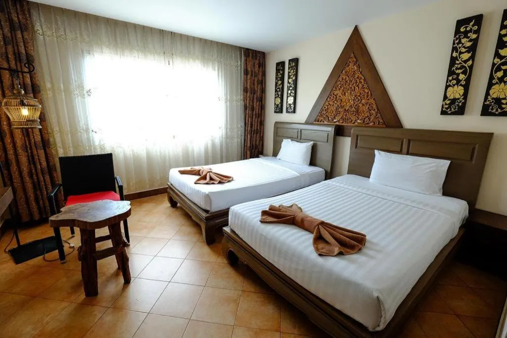 Bed in Red Balcony Hotel