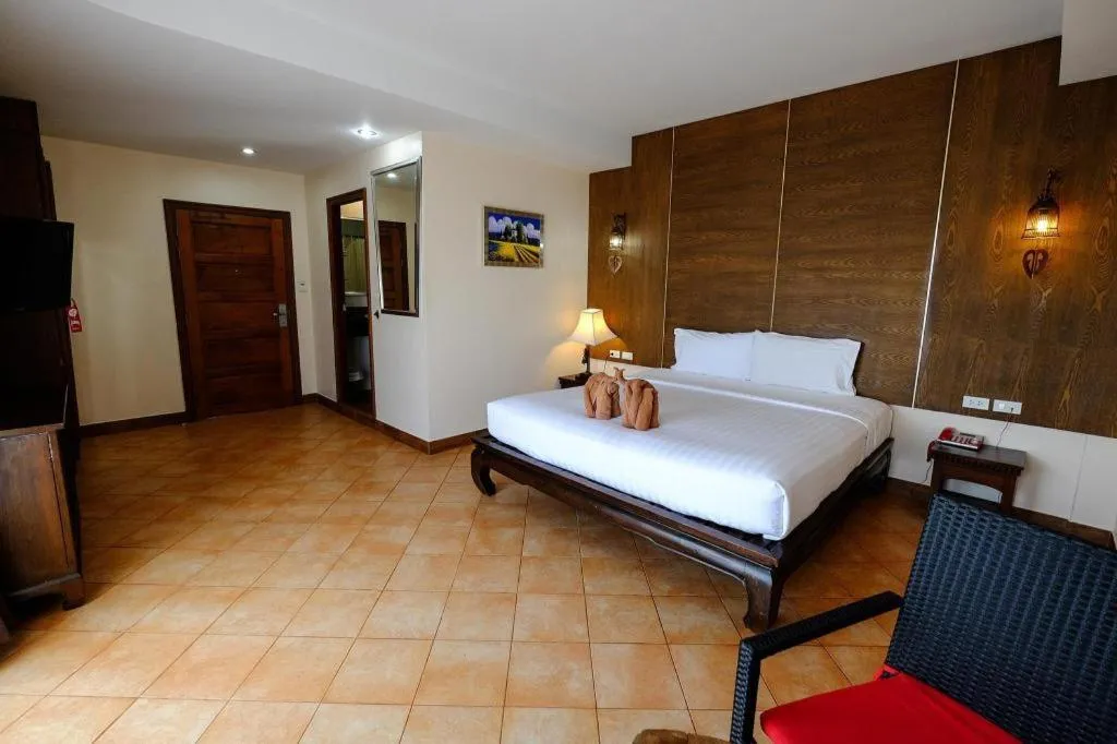 Bed in Red Balcony Hotel