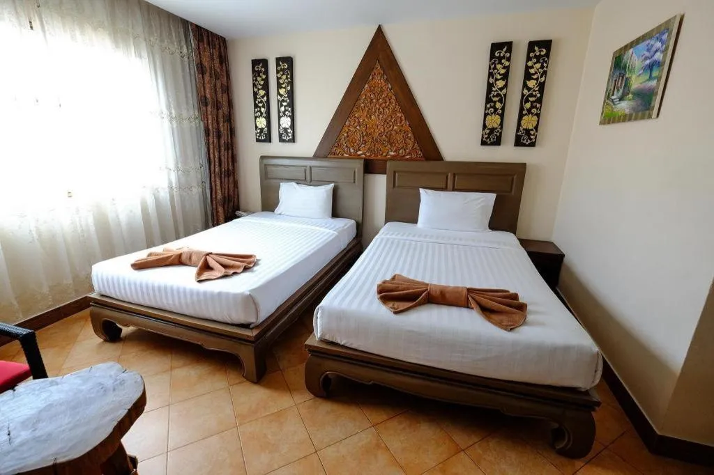 Bed in Red Balcony Hotel