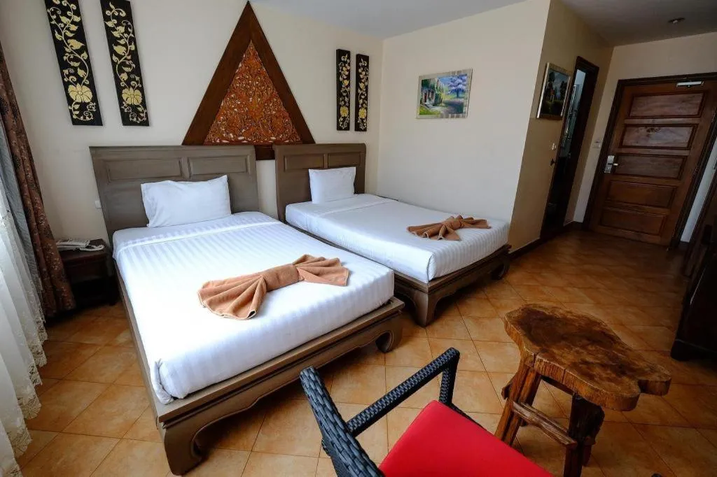 Bed in Red Balcony Hotel