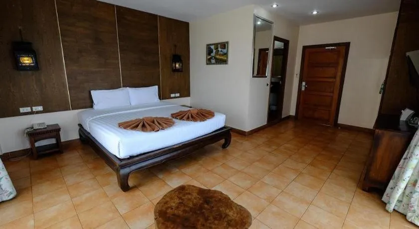 Bed in Red Balcony Hotel