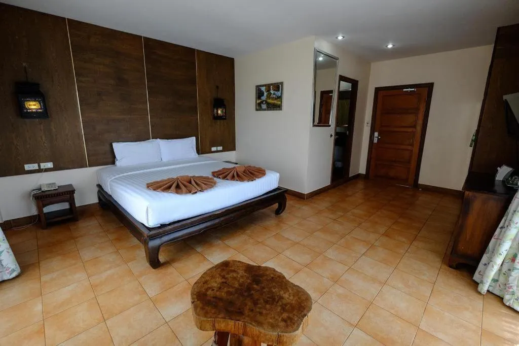 Bed in Red Balcony Hotel