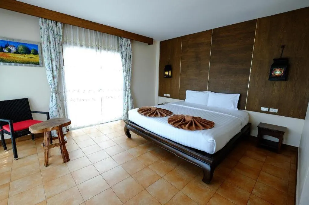 Bed in Red Balcony Hotel