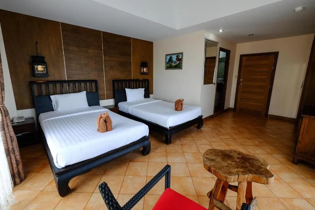 Bed in Red Balcony Hotel