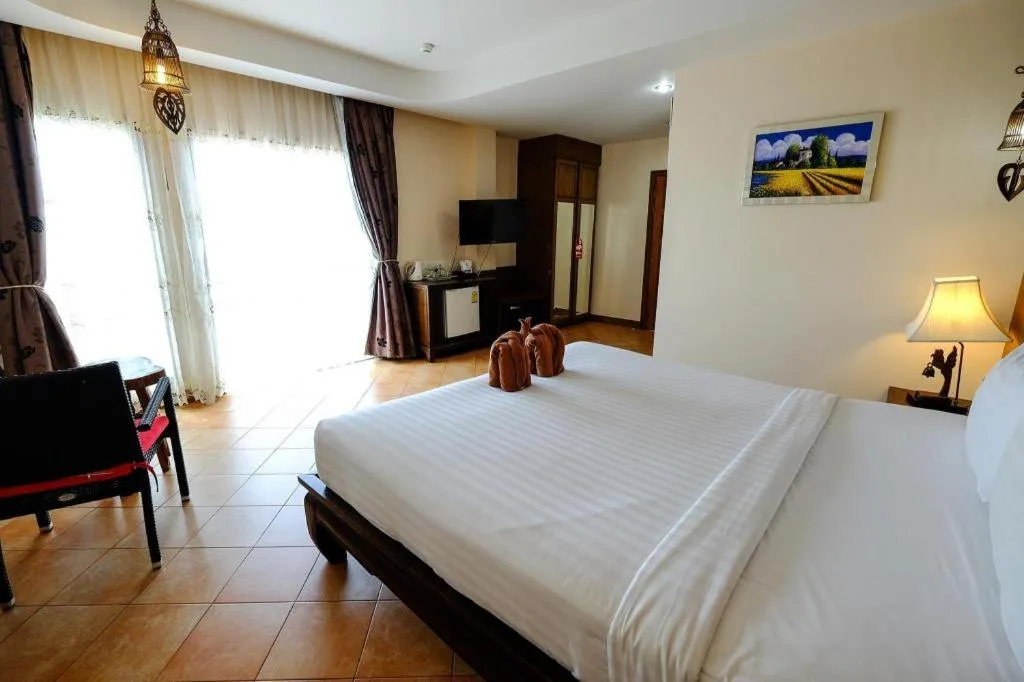 Bed in Red Balcony Hotel