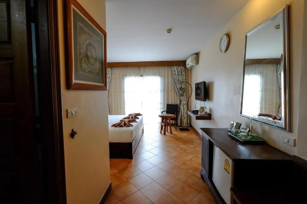 Bed in Red Balcony Hotel