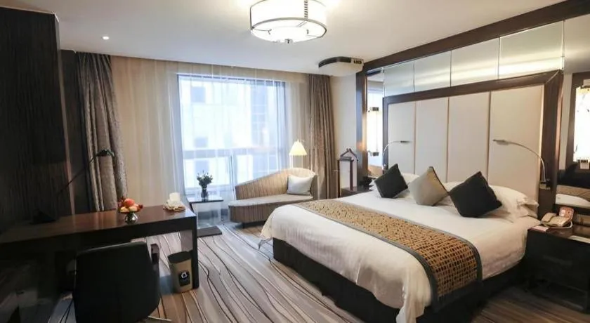 Bed in Grand Soluxe Zhongyou Hotel