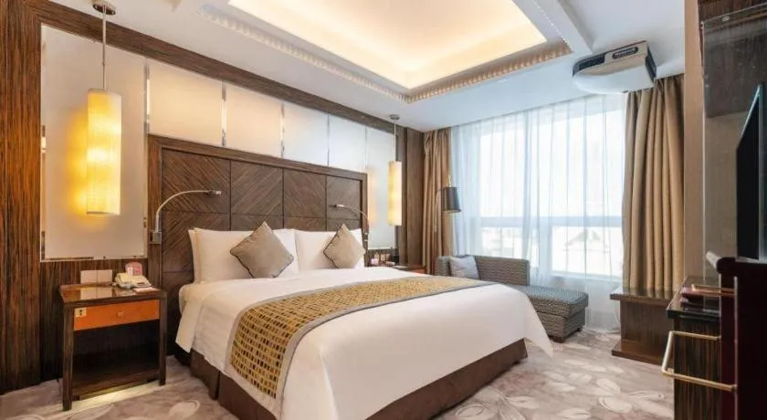 Bed in Grand Soluxe Zhongyou Hotel