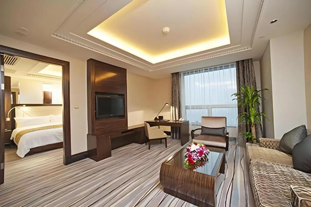 Bed in Grand Soluxe Zhongyou Hotel