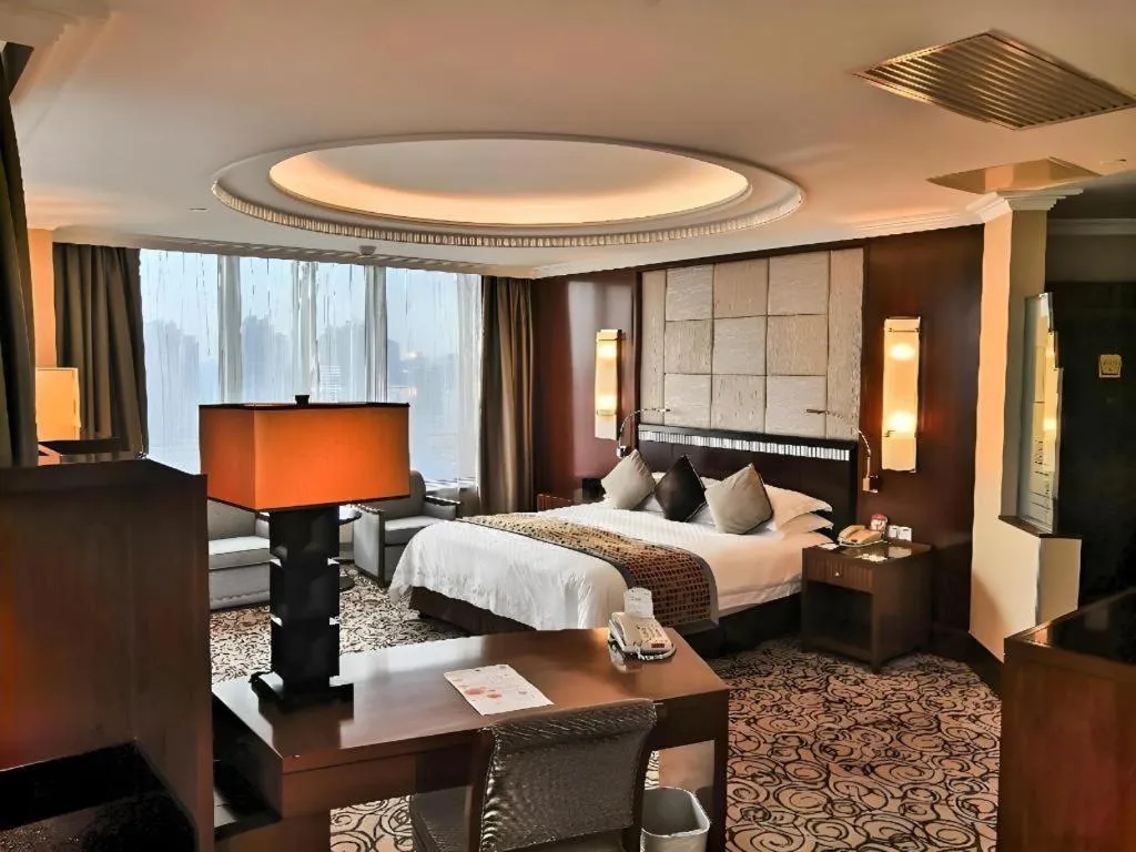 Bed in Grand Soluxe Zhongyou Hotel