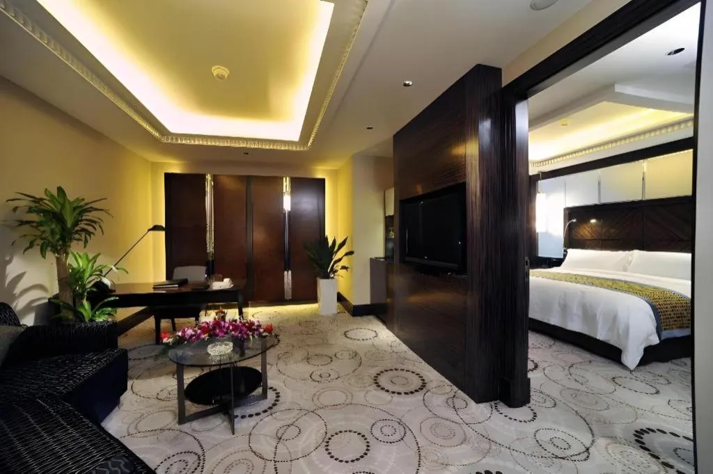 Bed in Grand Soluxe Zhongyou Hotel