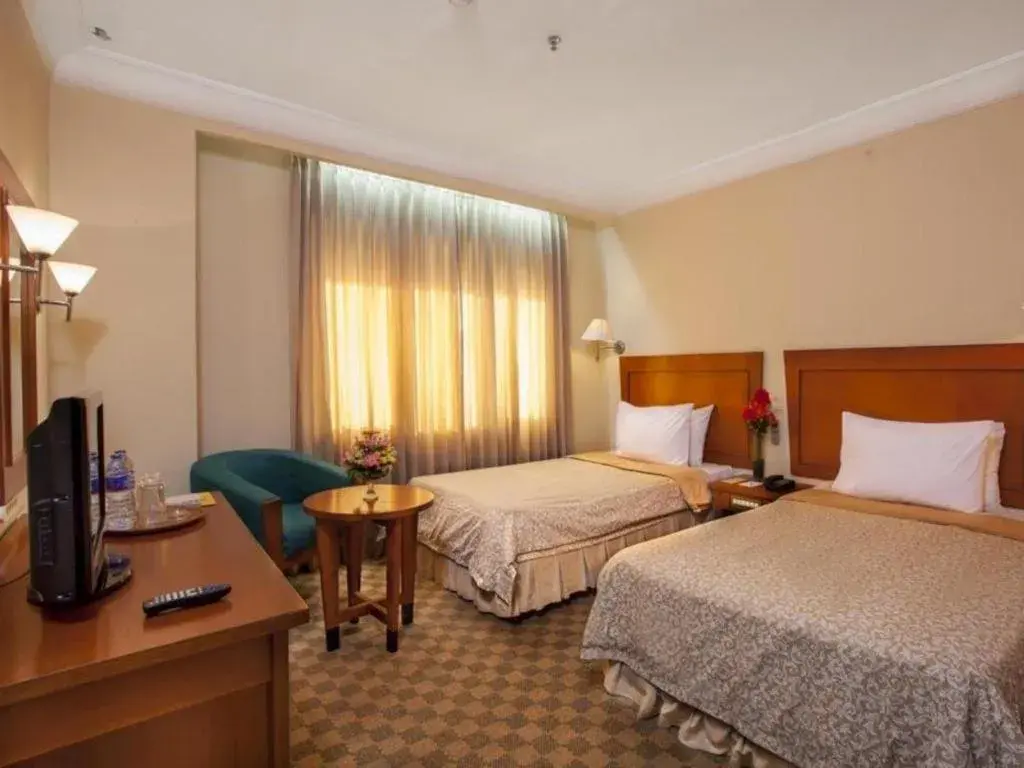 Bed in Nalendra Hotel Bed in Nalendra Hotel