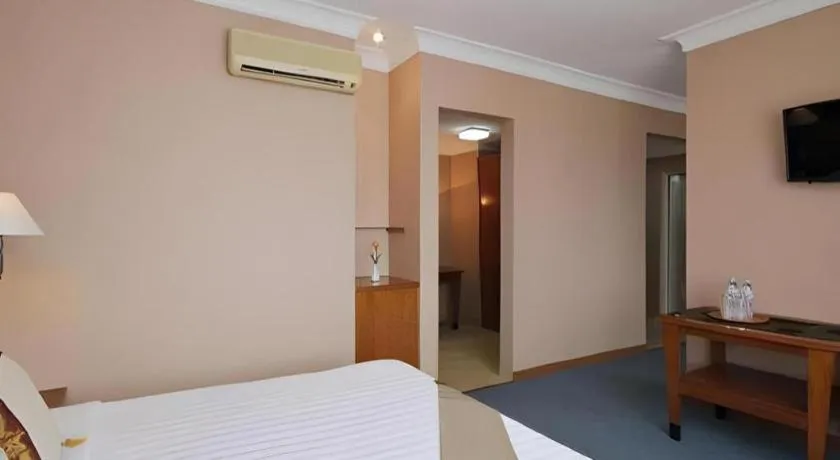 Bed in Nalendra Hotel