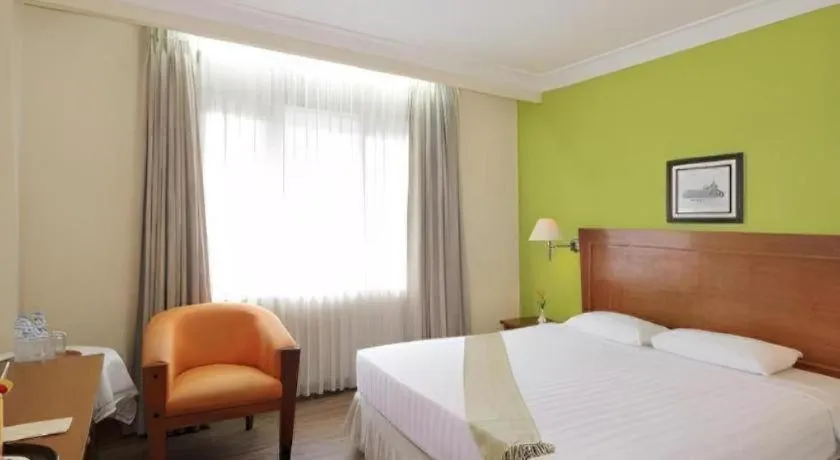 Bed in Nalendra Hotel