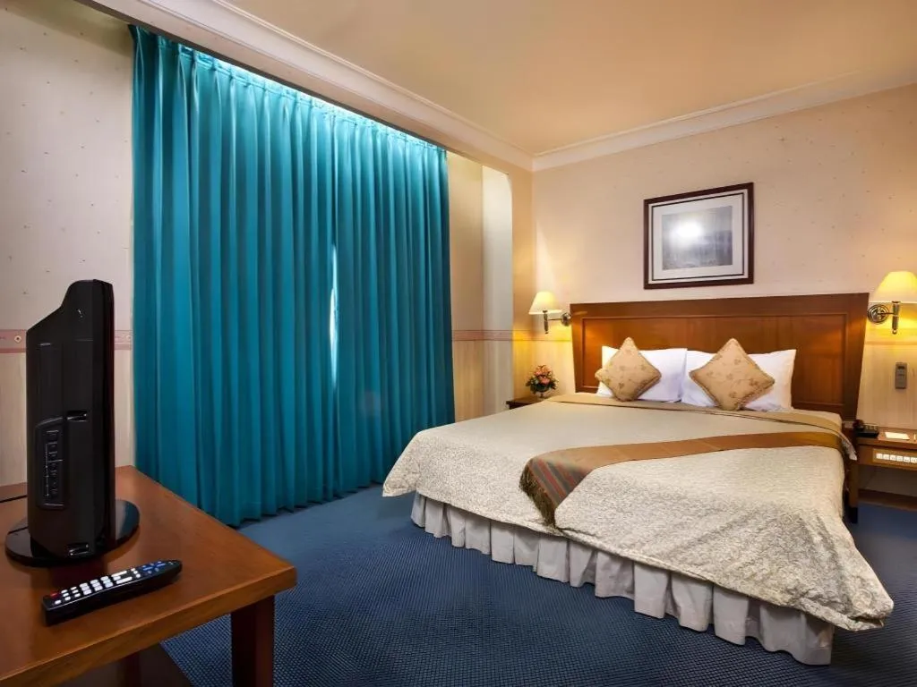 Bed in Nalendra Hotel