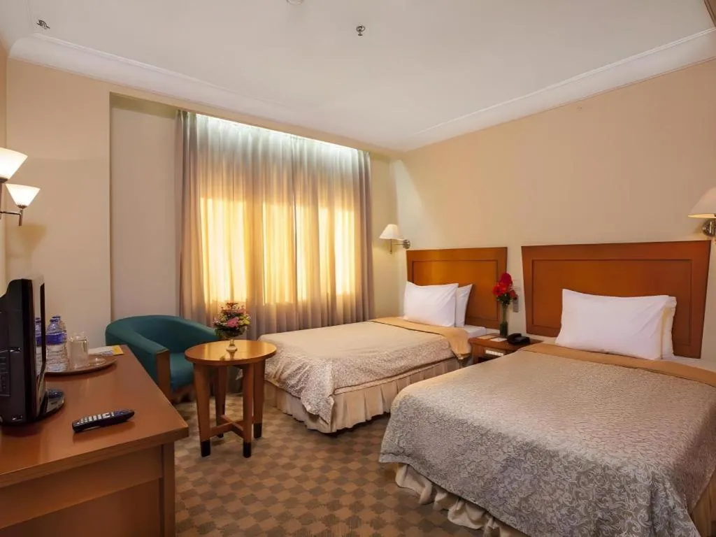 Bed in Nalendra Hotel