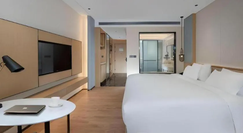 Bed in Hongfeng Hotel Nanshan Branch