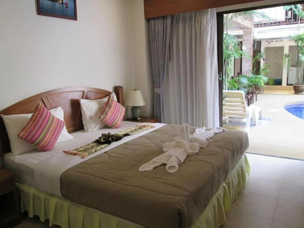 Bed in MT Hotel Patong