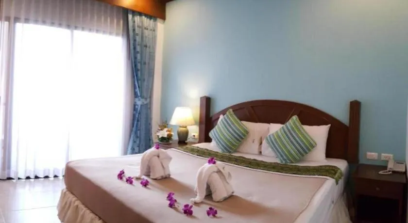 Bed in MT Hotel Patong