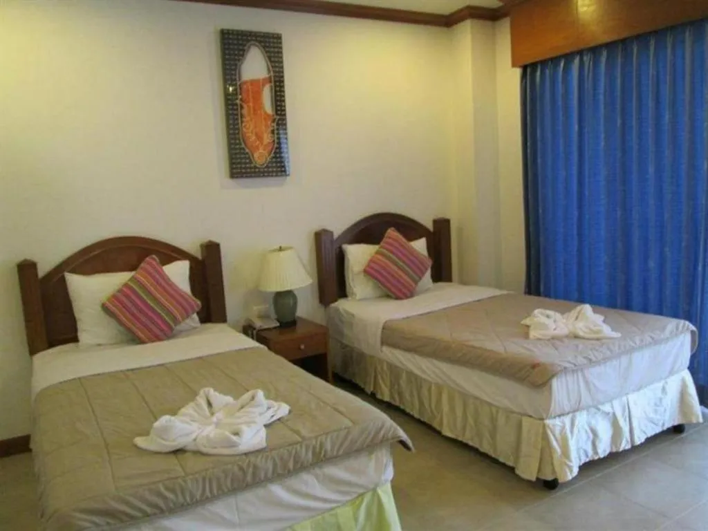 Bed in MT Hotel Patong