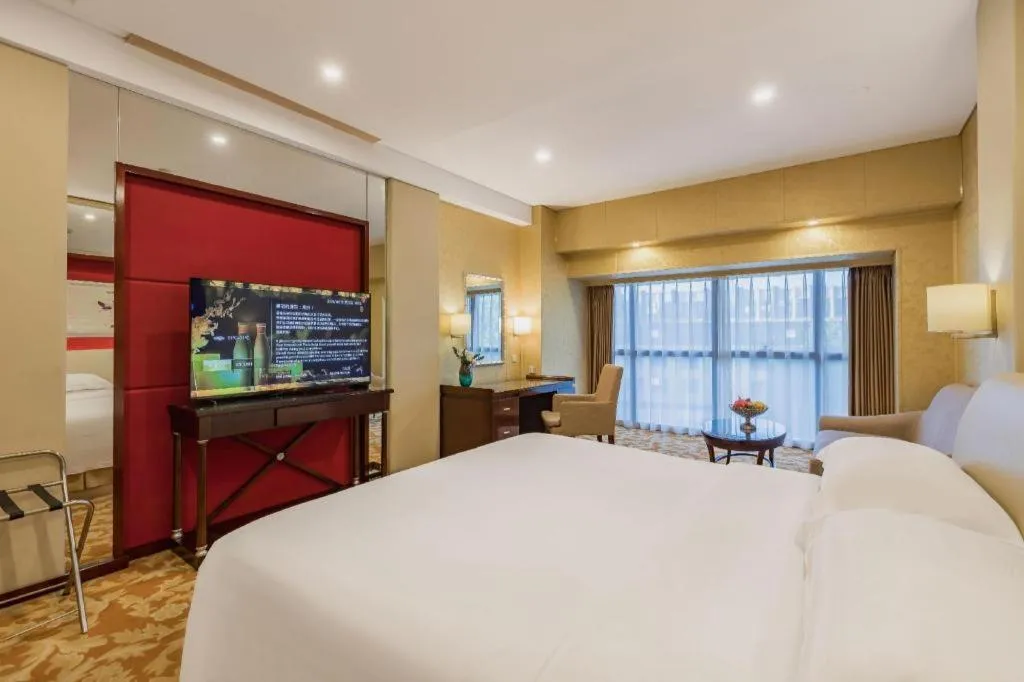 Bed in West International Trade Grand Hotel