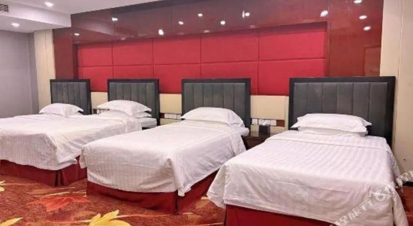 Bed in West International Trade Grand Hotel