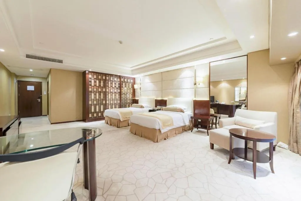 Bed in West International Trade Grand Hotel