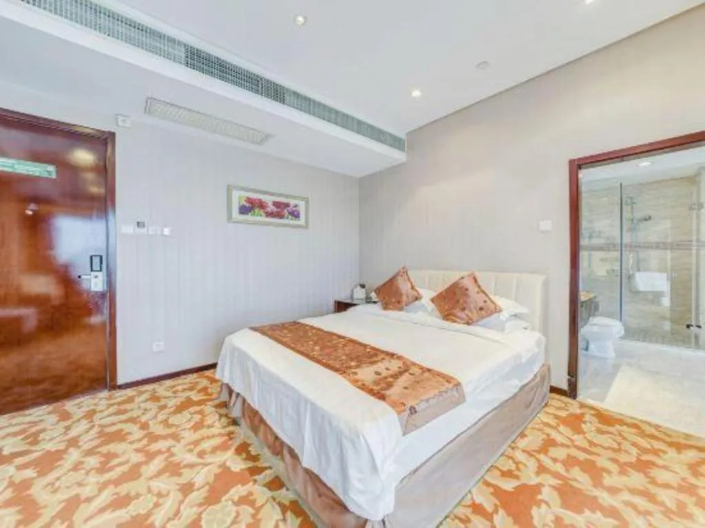 Bed in West International Trade Grand Hotel